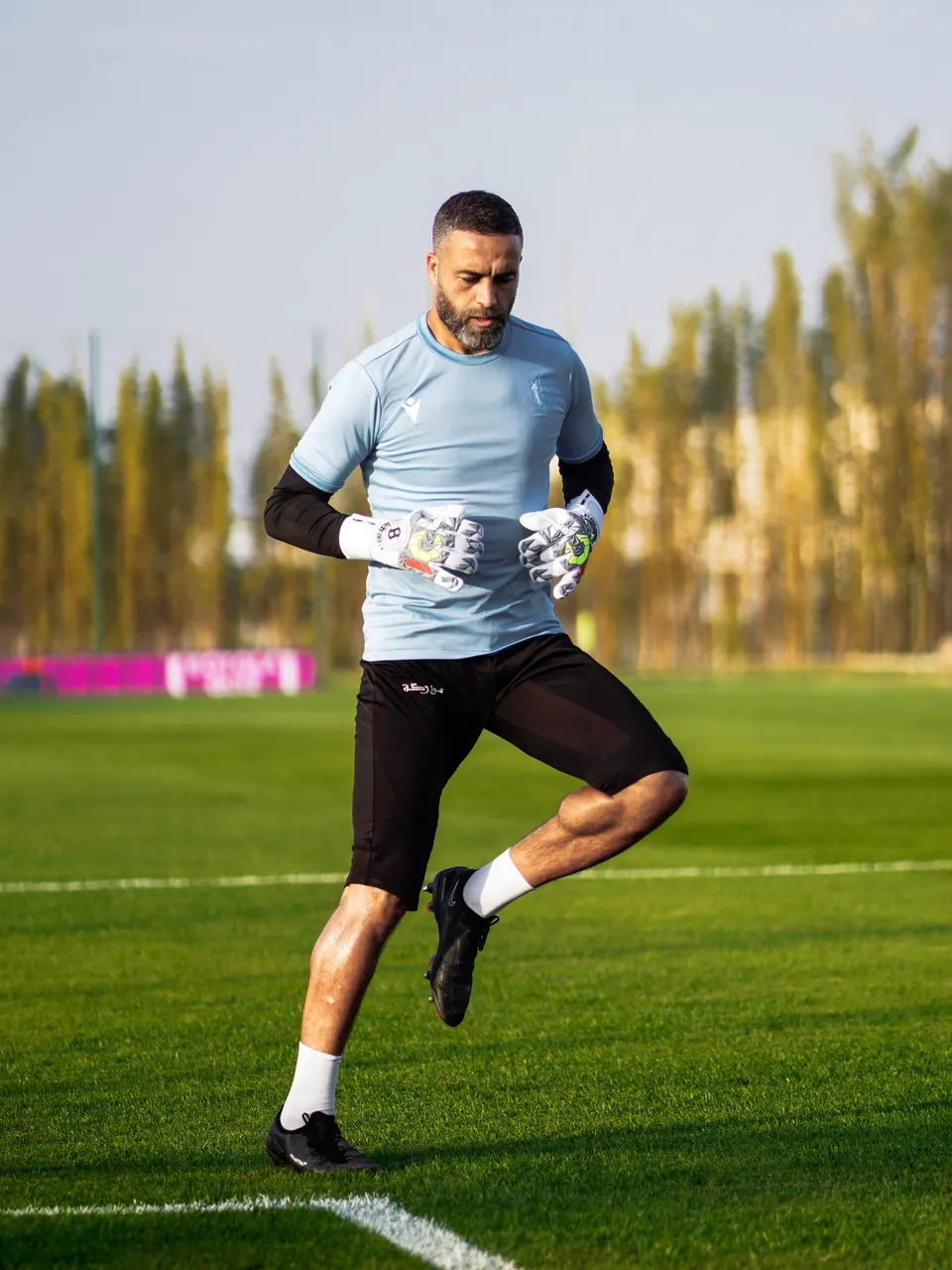 El houasli warming up for wydad vs touarga